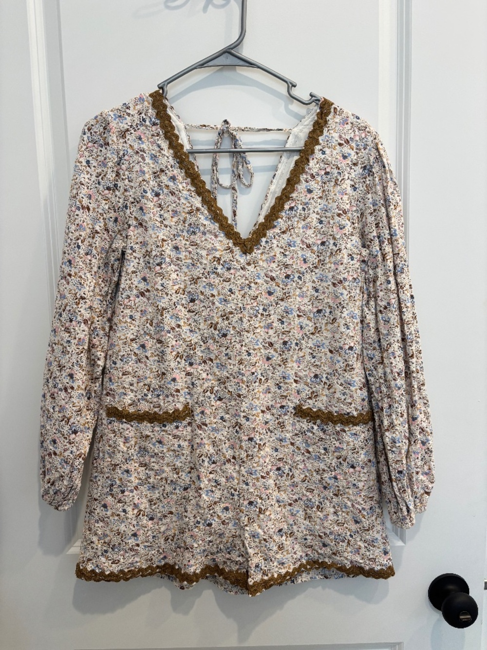 These Three Boutique Long Sleeved Eyelet Romper
